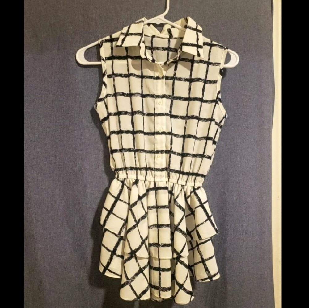 Whit and black womans blouse